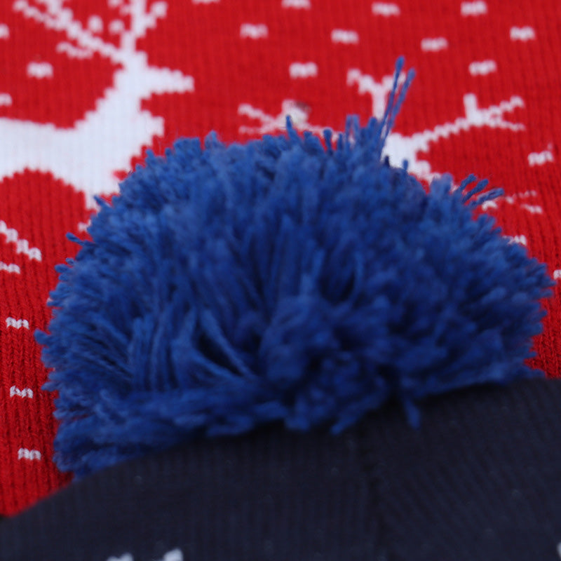 Färgglad lysande stickad julhatt